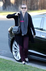Alyson Hannigan gives a wave and a smile visiting a friend. January 3, 2013  (4).jpg