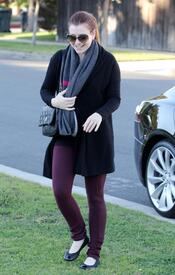 Alyson Hannigan gives a wave and a smile visiting a friend. January 3, 2013  (6).jpg