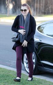 Alyson Hannigan gives a wave and a smile visiting a friend. January 3, 2013  (7).jpg