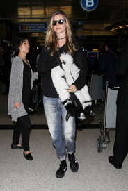 Behati-Prinsloo-in-Jeans-at-LAX--02.jpg