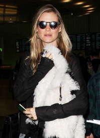 Behati-Prinsloo-in-Jeans-at-LAX--03.jpg