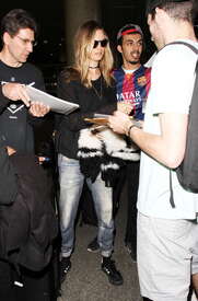 Behati-Prinsloo-in-Jeans-at-LAX--04.jpg