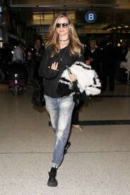 Behati-Prinsloo-in-Jeans-at-LAX--05.jpg