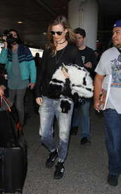 Behati-Prinsloo-in-Jeans-at-LAX--08.jpg