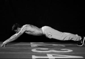 man_stretch_on_fingertips_toes_06_ehss.jpg