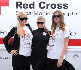 celebrity_paradise.com_TheElder_ParisandNickyHilton2011_03_27_ReliefRun17.jpg