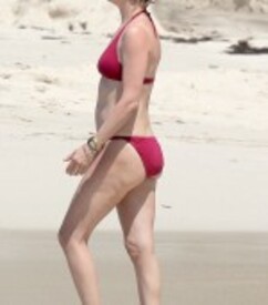Uma-Thurman-Wears-A-Red-Bikini-While-Swi.jpg