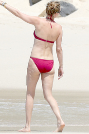 Uma-Thurman-Wears-A-Red-Bikini-While-Swimming-In-St.-Barts-02.jpg