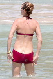 Uma-Thurman-Wears-A-Red-Bikini-While-Swimming-In-St.-Barts-05.jpg