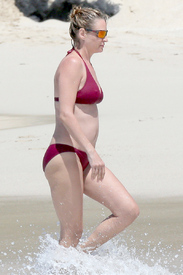 Uma-Thurman-Wears-A-Red-Bikini-While-Swimming-In-St.-Barts-08.jpg