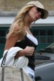 th_2669553_Nadine_Coyle__Hotpants_candids_April_27_4_.jpg