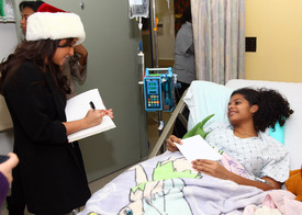 celebrity-paradise.com-The_Elder-Adrienne_Bailon_2009-12-23_-_Visits_Children_At_The_Beth_Israel_Medical_Center_4141.jpg