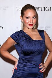 celebrity-paradise.com-The_Elder-Adrienne_Bailon_2010-02-16_-_Bebe_Show_at_MBFW_122.jpg