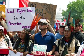 The actor, known for his environmental activism, held a sign that read 'Climate change is real'_0002.jpg