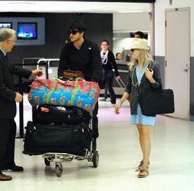 013_Reese_Witherspoon__Jake_Gyllenhaal_arrive_together_from_Paris.jpg