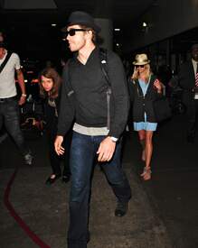 017_Reese_Witherspoon__Jake_Gyllenhaal_arrive_together_from_Paris.jpg