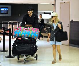 023_Reese_Witherspoon__Jake_Gyllenhaal_arrive_together_from_Paris.jpg