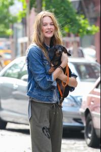 Behati+Prinsloo+Behati+Prinsloo+Cuddles+Puppy+zVEg2sJjRu5x.jpg