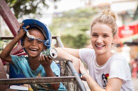 Rosie-Huntington-Whiteley-1-Vogue-23May14-Unicef-Cam14-Sharron-Lovell_b_1080x720.jpg