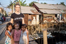 Rosie-Huntington-Whiteley-3-Vogue-23May14-Unicef-Cam14-Sharron-Lovell_b_1080x720.jpg