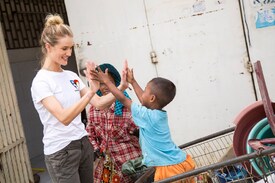 Rosie-Huntington-Whiteley-6-Vogue-23May14-Unicef-Cam14-Sharron-Lovell_b_1080x720.jpg