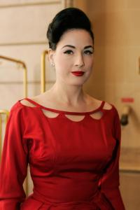73693_dita_von_teese_arrives_to_Elie_Saab_fashion_show_04_122_848lo.jpg