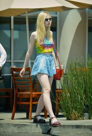 elle-fanning-in-mini-skirt-stopping-by-v.jpg