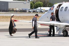 kaley-cuoco-boarding-at-a-private-jet-in-van-nuys-06-20-2016_4.jpg