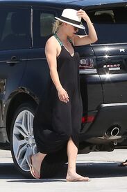 kaley-cuoco-boarding-at-a-private-jet-in-van-nuys-06-20-2016_9.jpg