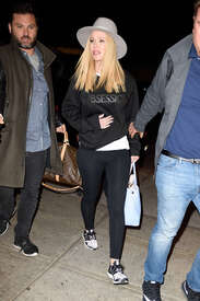 Iggy-Azalea--Arrives-at-JFK-Airport--01.jpg