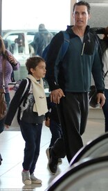 Casual dad_ Clearly keen to enjoy a comfortable flight, the Wolf Of Wall Street actor opted for a dressed down and casual look.jpg