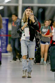 Cara-Delevingne-at-JFK-Airport--07.jpg