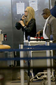 Cara-Delevingne-at-JFK-Airport--10.jpg