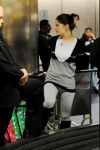 46596_laetitia_casta_arrives_into_lax_080508_11_12.jpg