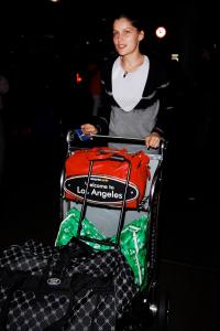 46297_laetitia_casta_arrives_into_lax_080508_12_12.jpg