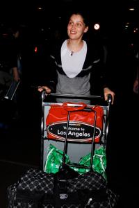 46384_laetitia_casta_arrives_into_lax_080508_15_12.jpg