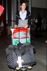 46669_laetitia_casta_arrives_into_lax_080508_17_12.jpg