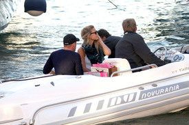91815_Bar_Refaeli_and_David_Fisher_out_in_Saint_Tropez_France_July_19_2011_065_123_424lo.jpg