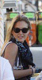 91835_Bar_Refaeli_and_David_Fisher_out_in_Saint_Tropez_France_July_19_2011_004_123_466lo.jpg