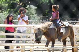 HalleBerryanddaughterNahlahadafun4thofJulyatGriffithParkinLosAngeles_13.jpg