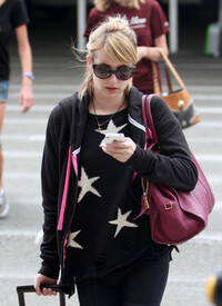 Emma_Roberts_Touches_Down_LAX_-ox1_Ah_KCLN6l.jpg