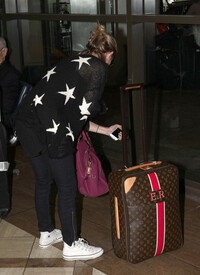 Emma_Roberts_Touches_Down_LAX_ammj_FVwh2_M6l.jpg