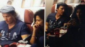 Matthew Mcconaughey com a mulher, Camila Alves, num voo para o Rio.jpg