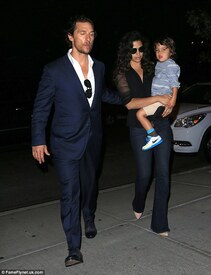 The doting mom of three hip carried her son Livingston, who at three years of age is adorable, back to their hotel.jpg
