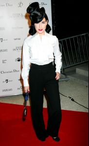 91365_Celebutopia_Dita_von_Teese_arrives_at_the_Patrick_Demarchelier45s_exhibition_Party_01_122_169lo.jpg