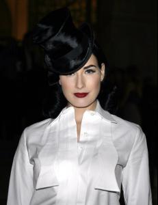 92251_Celebutopia_Dita_von_Teese_arrives_at_the_Patrick_Demarchelier81s_exhibition_Party_06_122_829lo.jpg