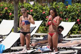 alex_morgan_and_sydney_leroux_in_bikinis_on_the_beach_in_hawaii_14.jpg