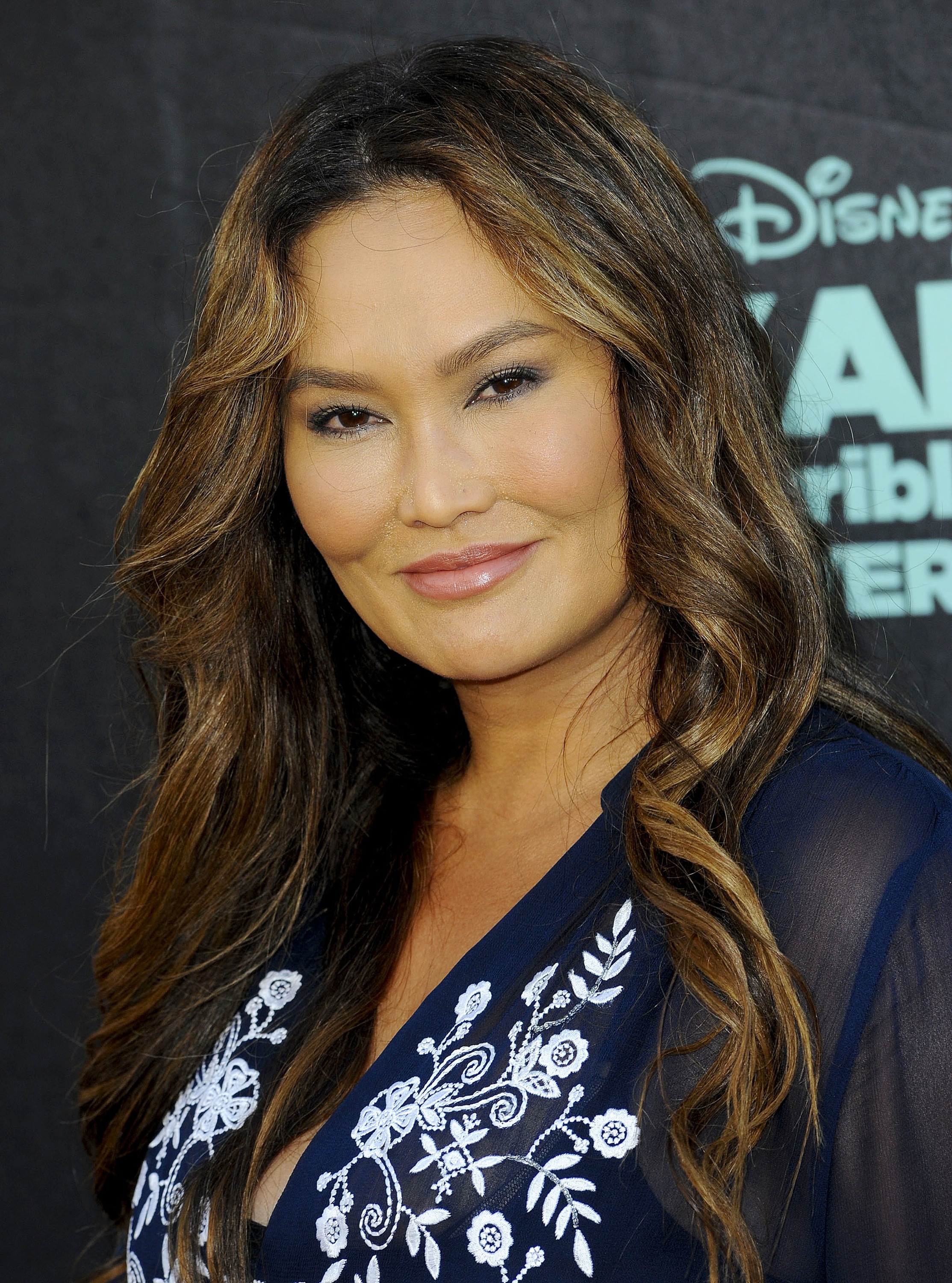 Tia Carrere attends the premiere of Alexander And Terrible, Horrible, No Go...