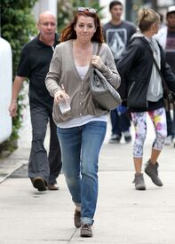 CU-Alyson Hannigan and husband take their daughter out for iced coffee in Santa Monica-15.jpg