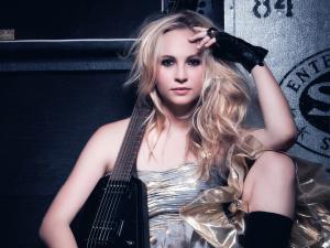 Candice_Accola_with_an_electric_guitar_029735_.jpg